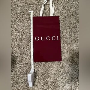 2 Gucci shopping bags